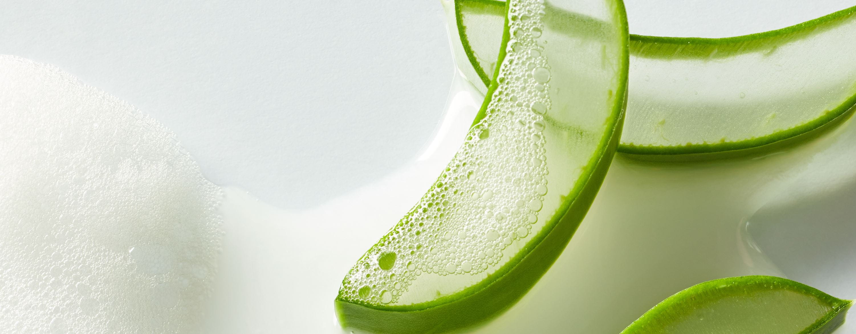 woman using aloe vera cream