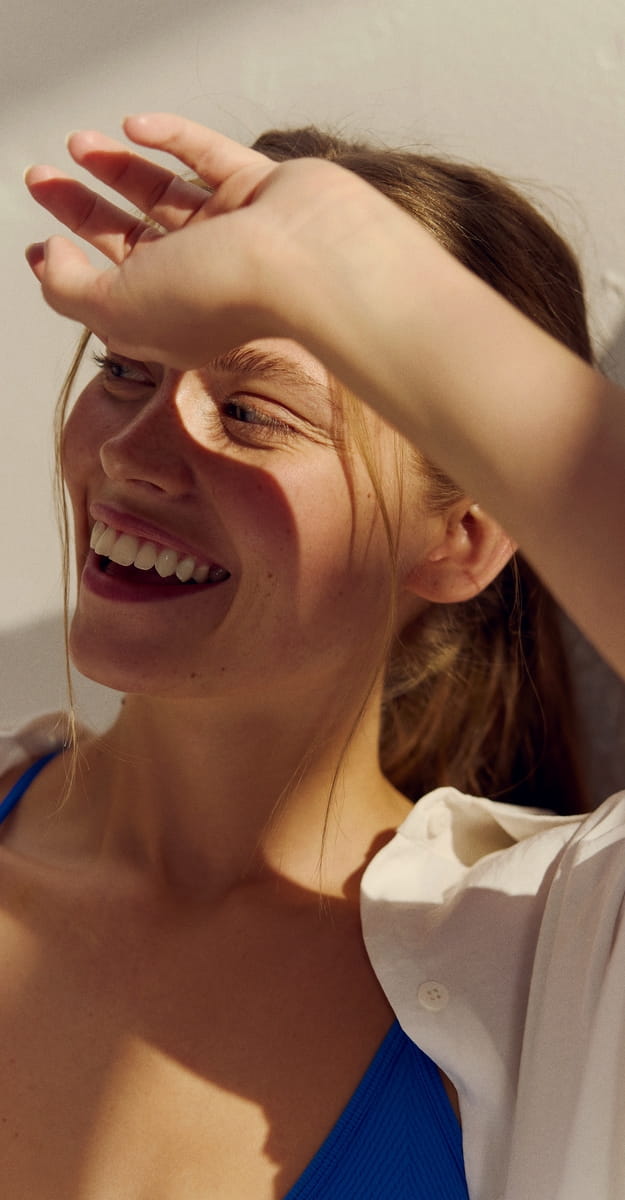 mască de față pe femeie