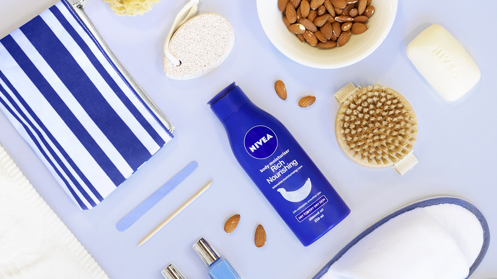 NIVEA Rich Nourishing Body Moisturiser with make-up items