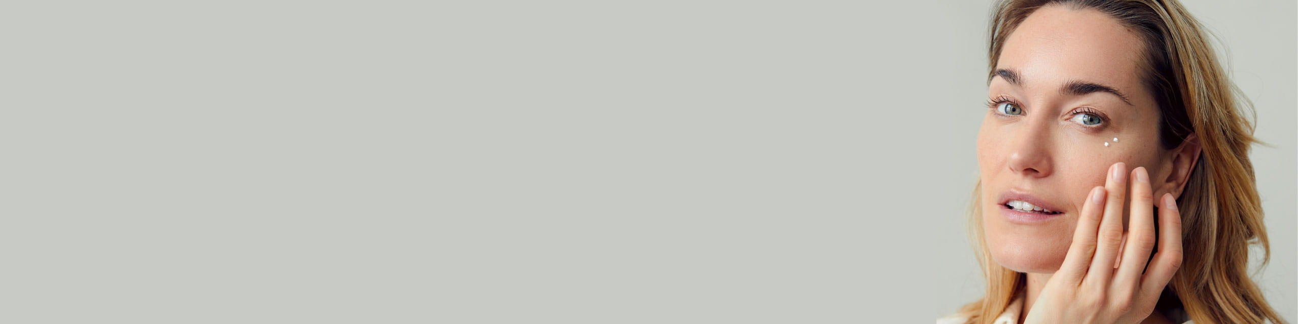 woman using anti-aging products