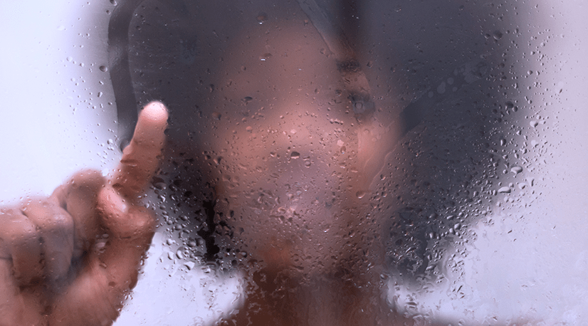 woman-behind-glass-shower-door-thumbnail