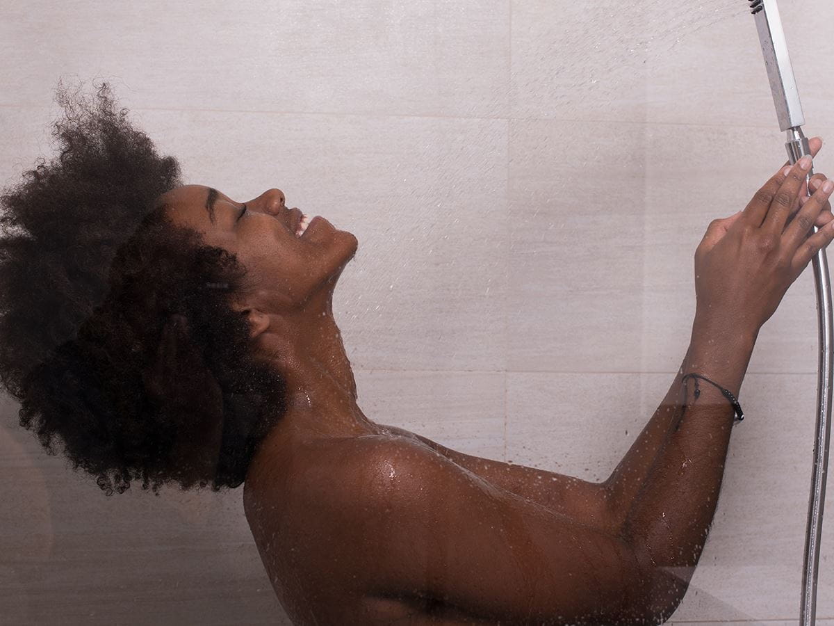 woman-unwinding-in-shower