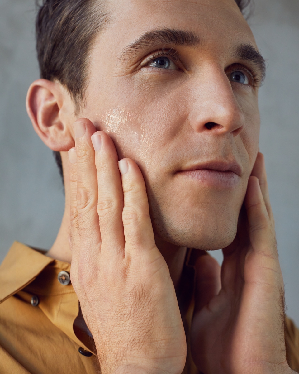 Man applying face cream