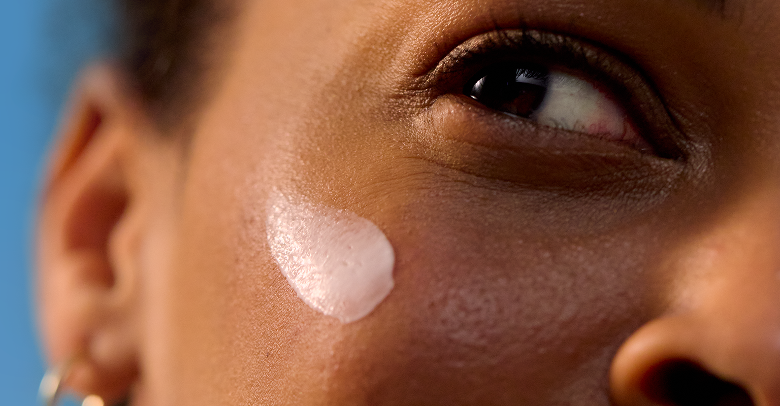 Woman face with face cream