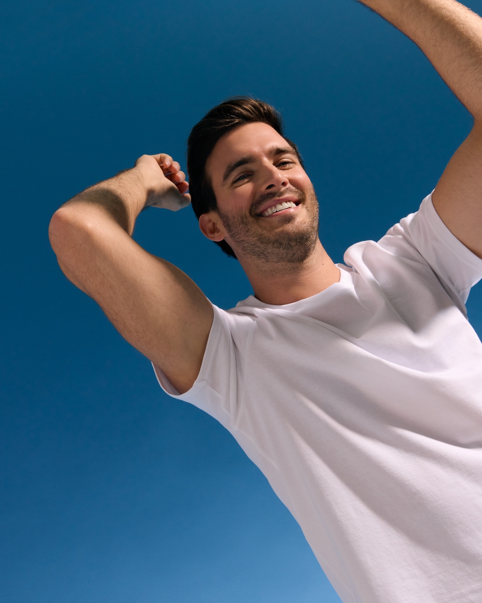 Men with white shirt under the blue sky