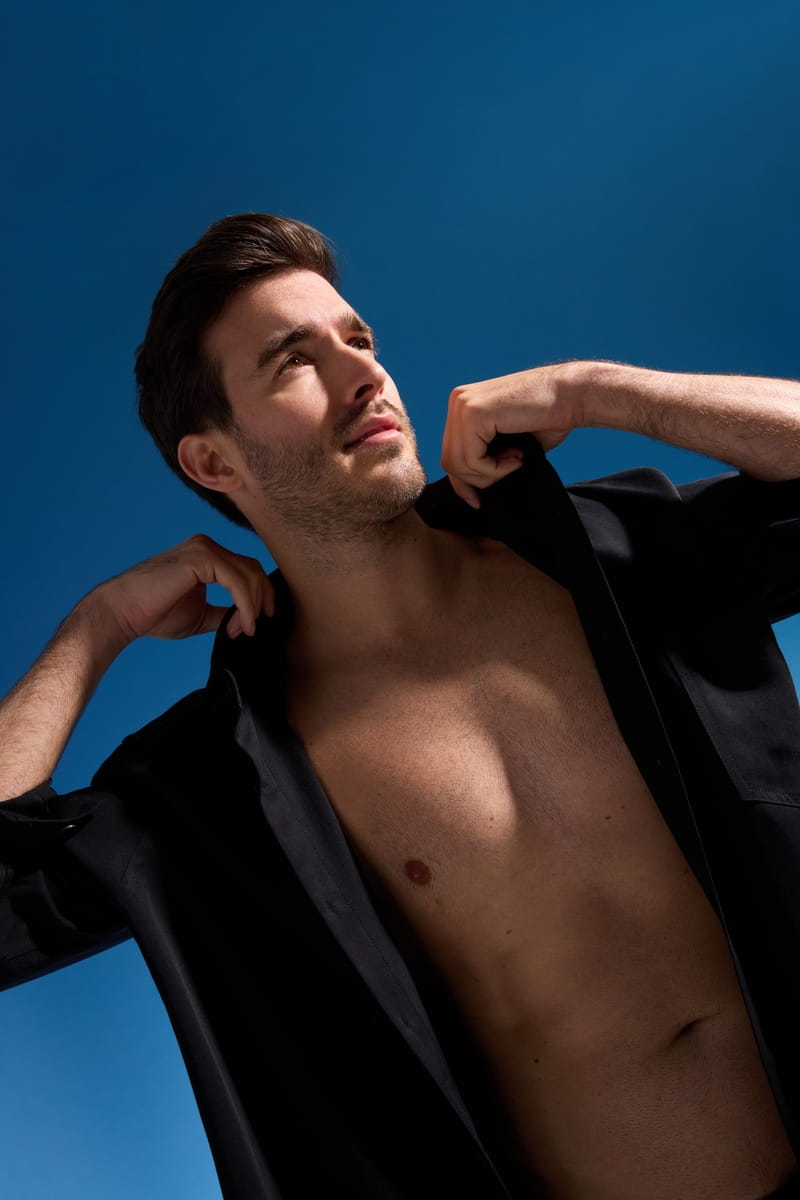 Men with black shirt under the blue sky