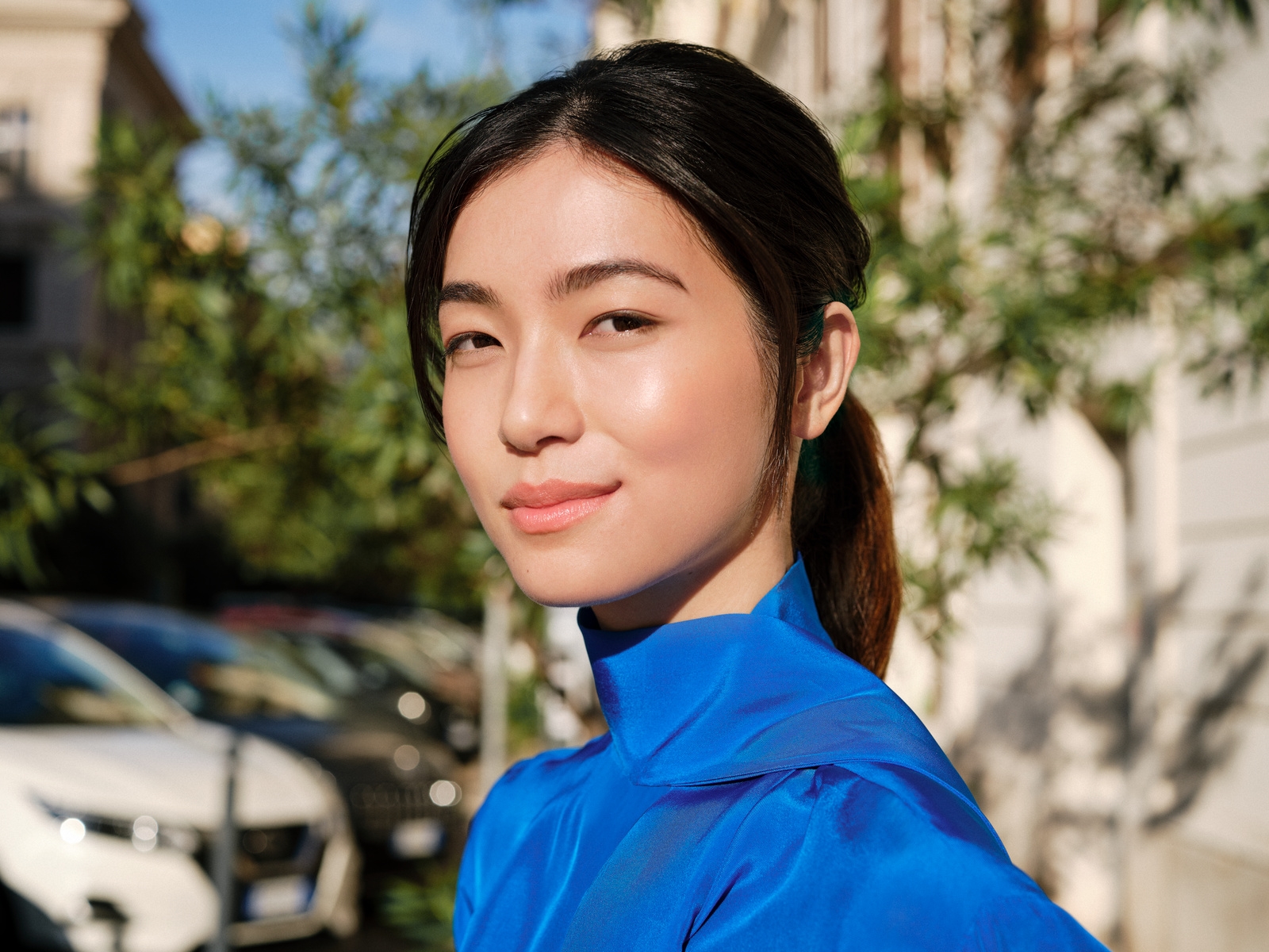 Smiling women with blue shirt