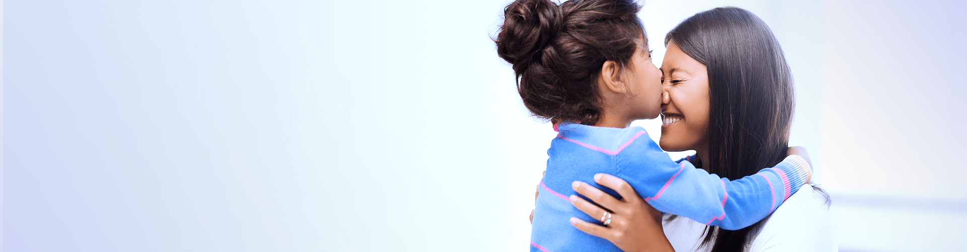 daughter kissed mom on her nose