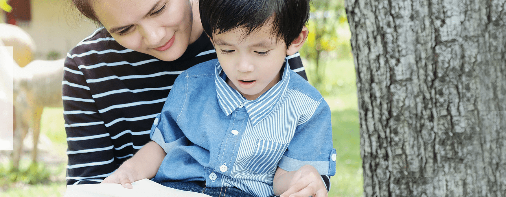 mom reading with son