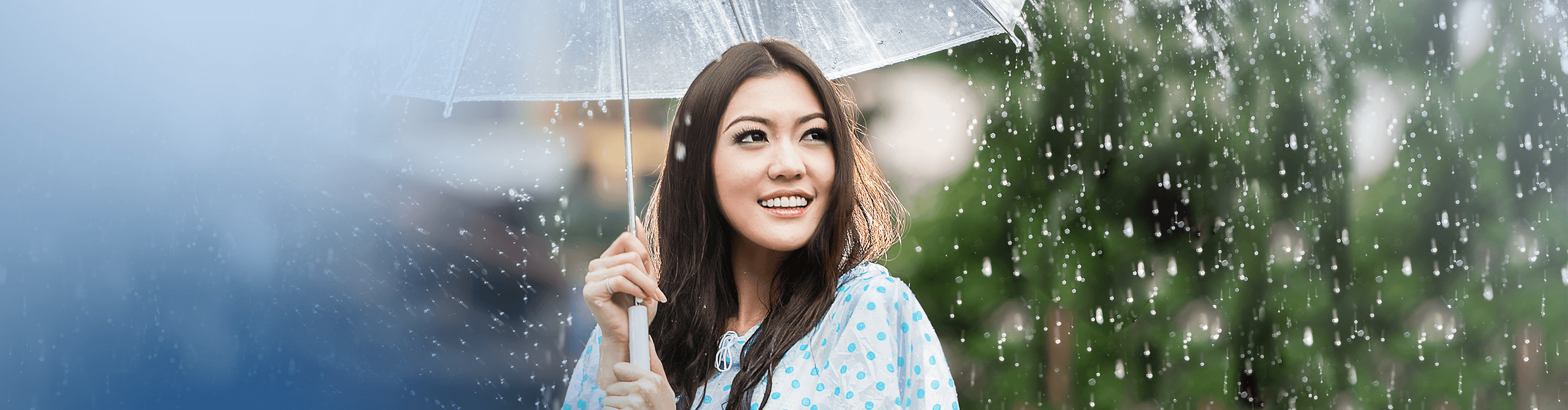 woman holding an umbrella in the rain