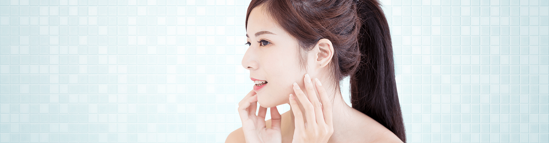 woman touching her face side shot