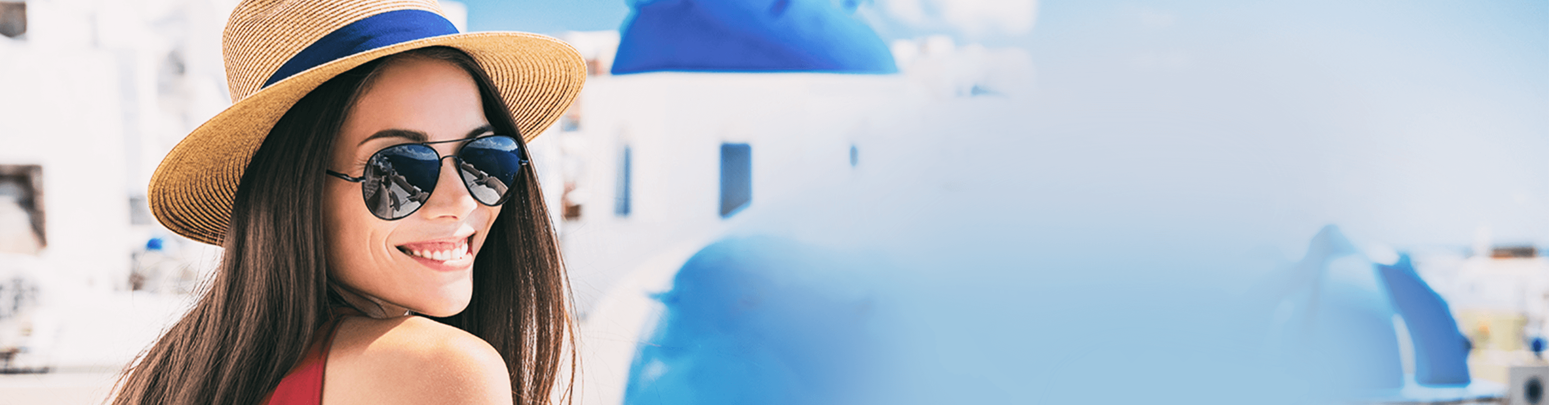 woman wearing a hat on a beach