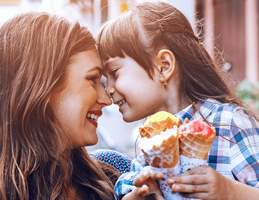 mom and daughter sharing ice creams