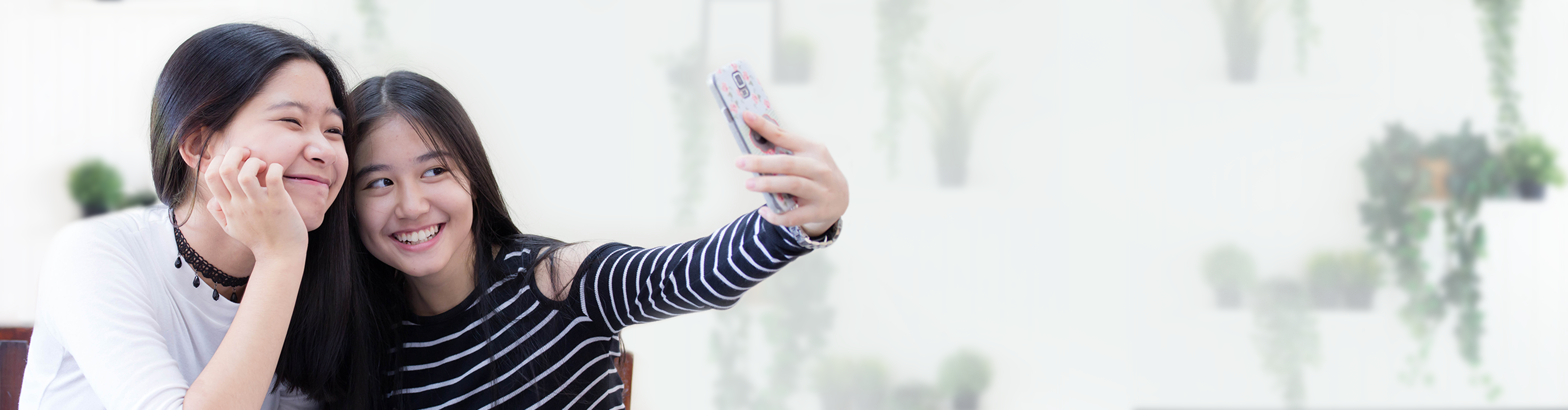two girls taking a selfie