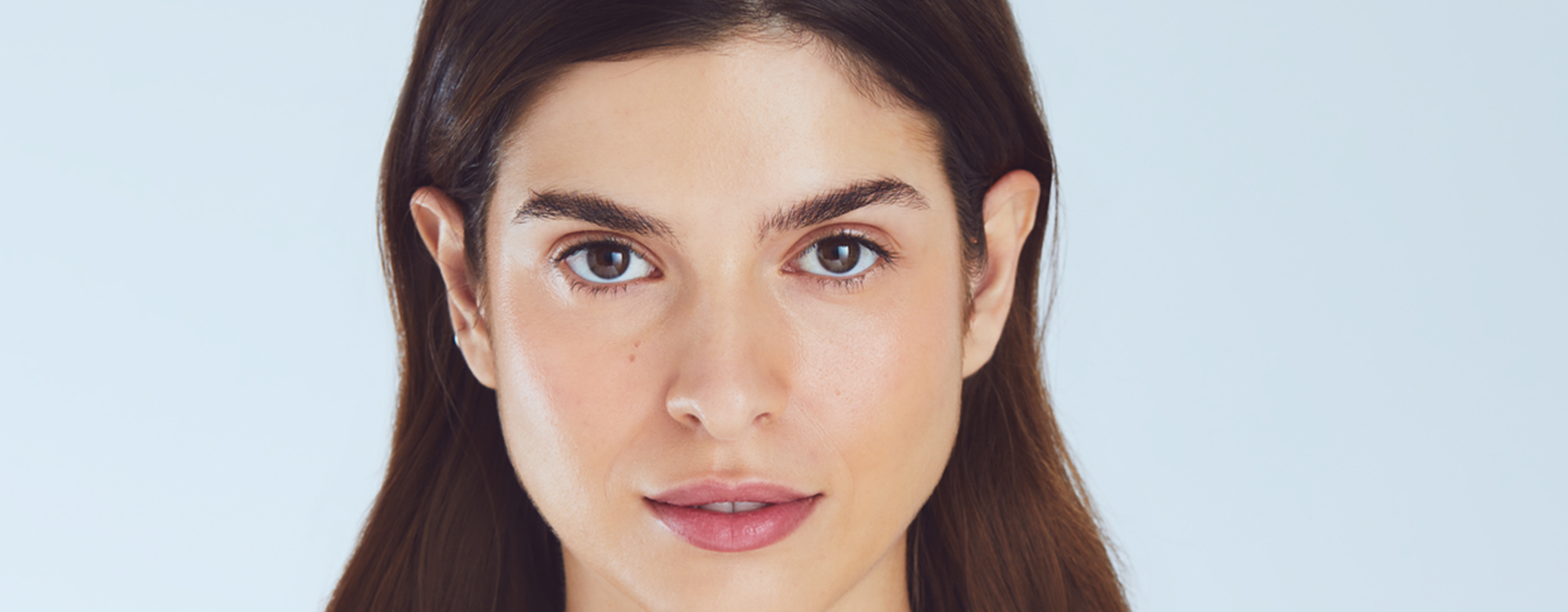 woman with thick brows and black hair