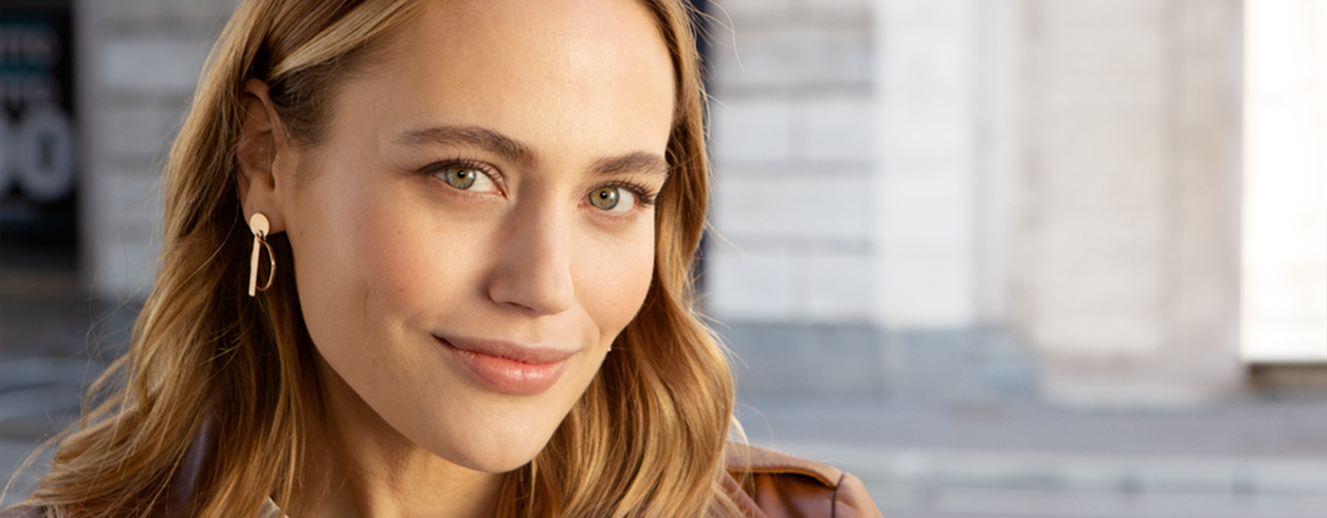 blonde woman with green eyes