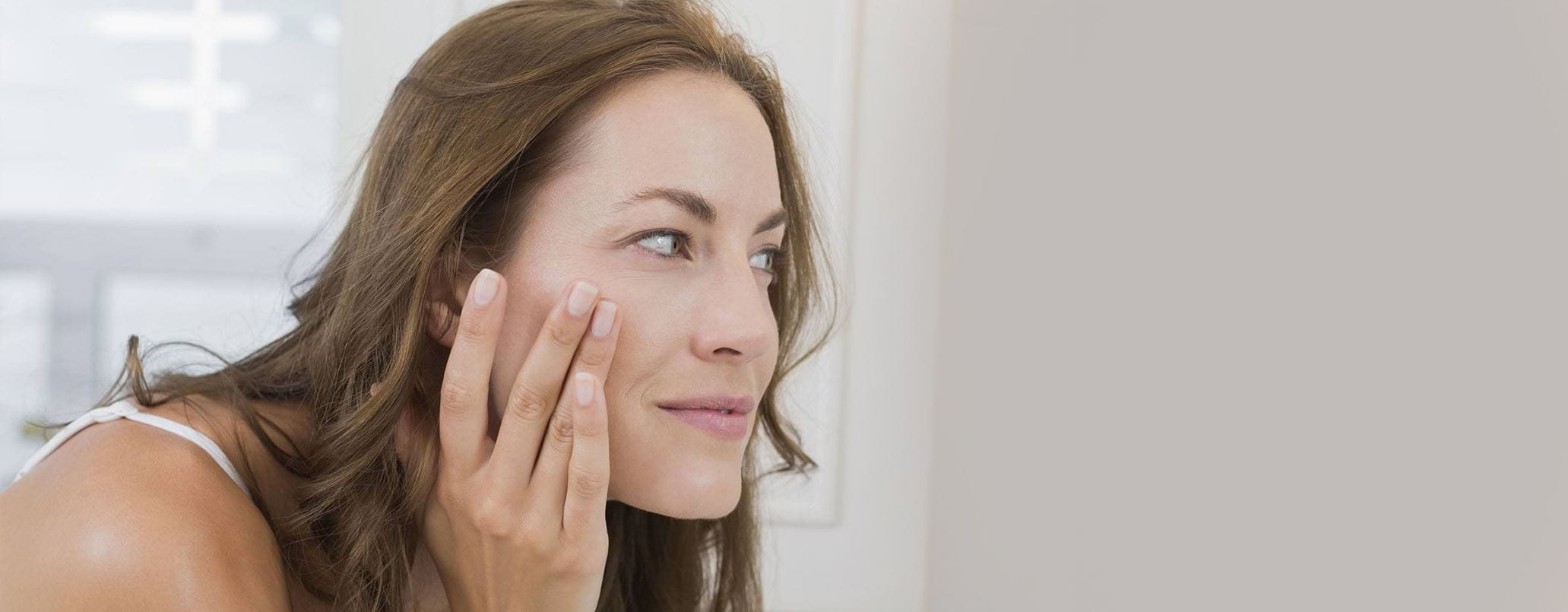 Come cancellare o nascondere le rughe di espressione