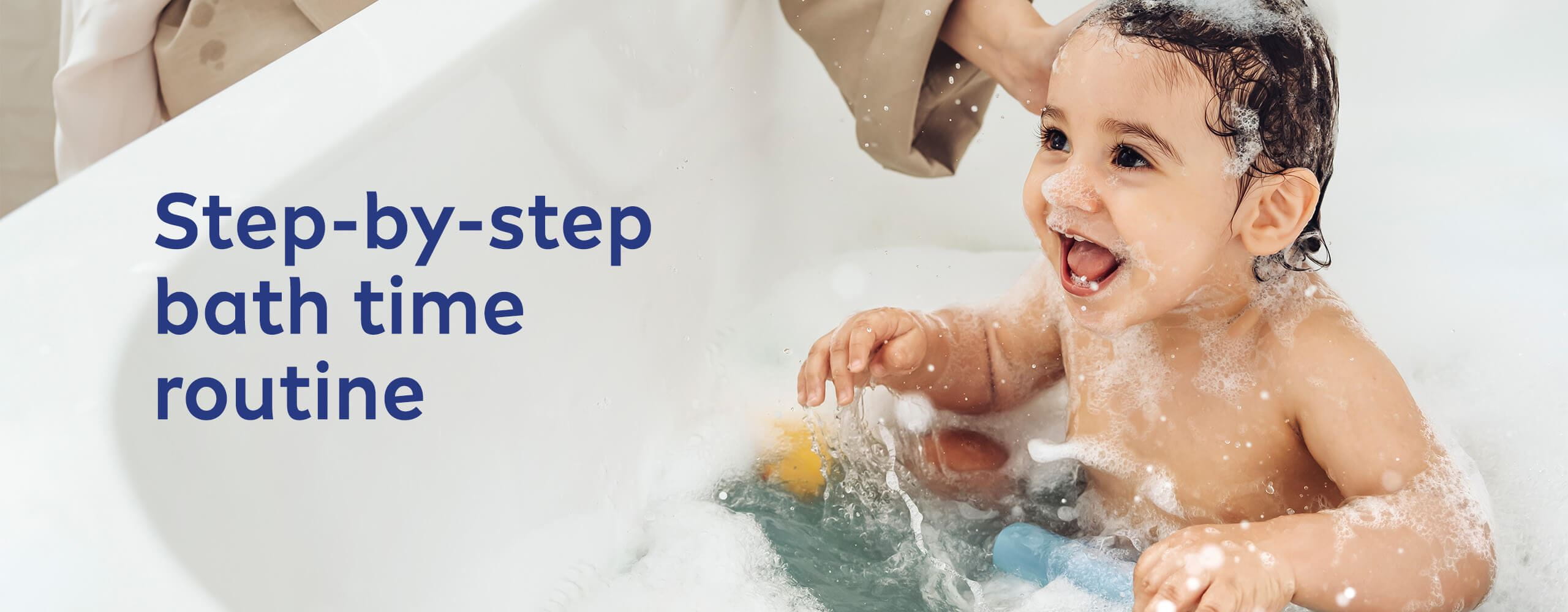 A Baby Playing Happily in the Bath Tub while Bathing