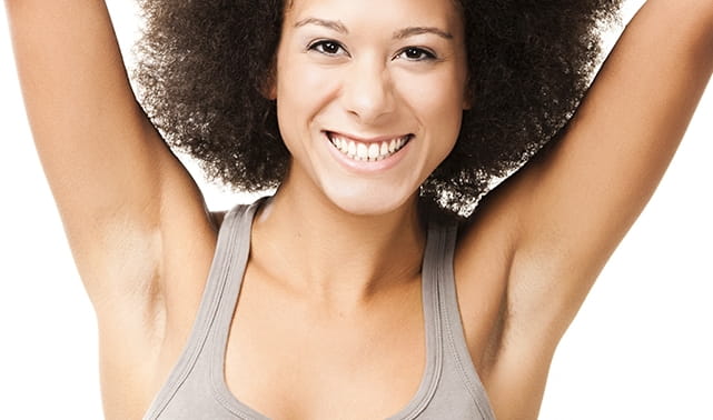 woman using alum deodorant