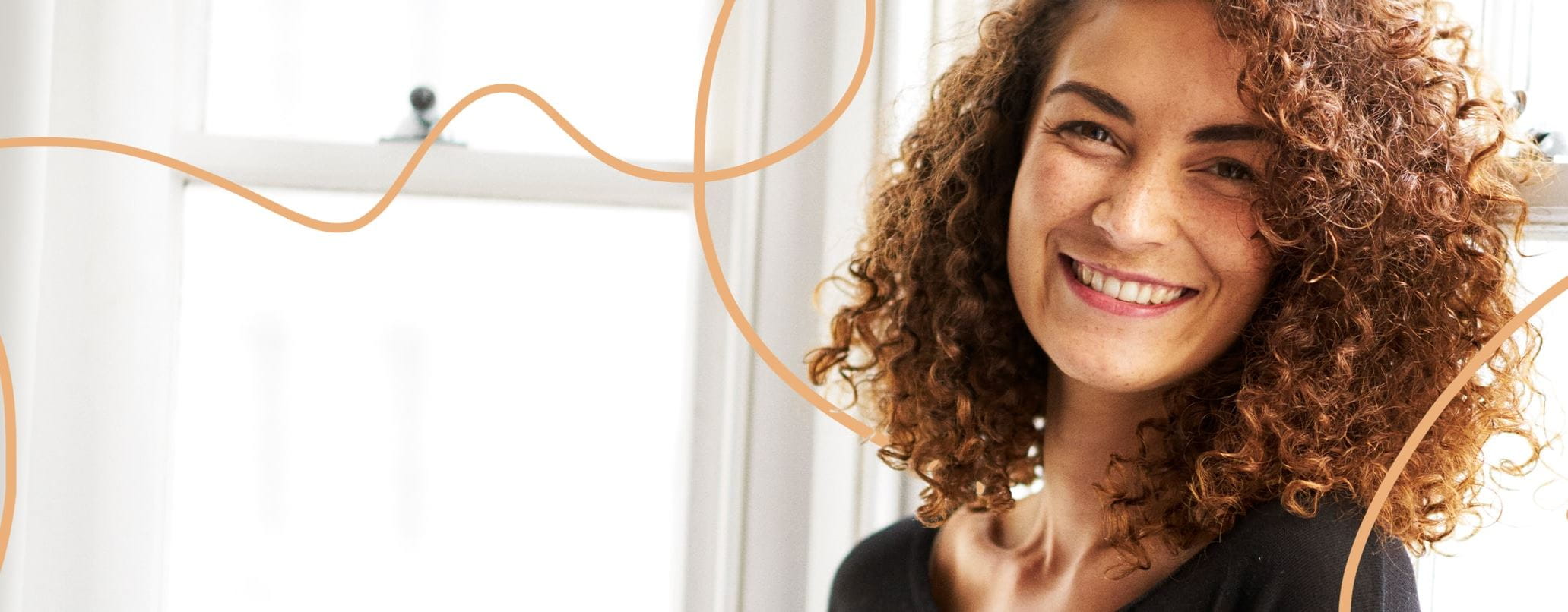 Kremy do włosów kręconych – stylizacja podkreślająca loki