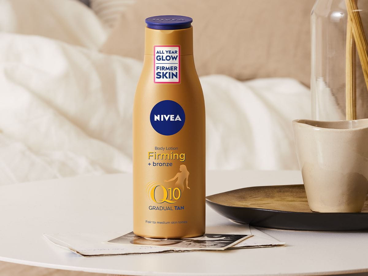 NIVEA Zpevňující tónovací tělové mléko Q10 