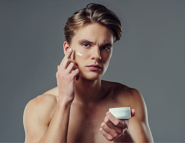 ์Nivea men applying cream