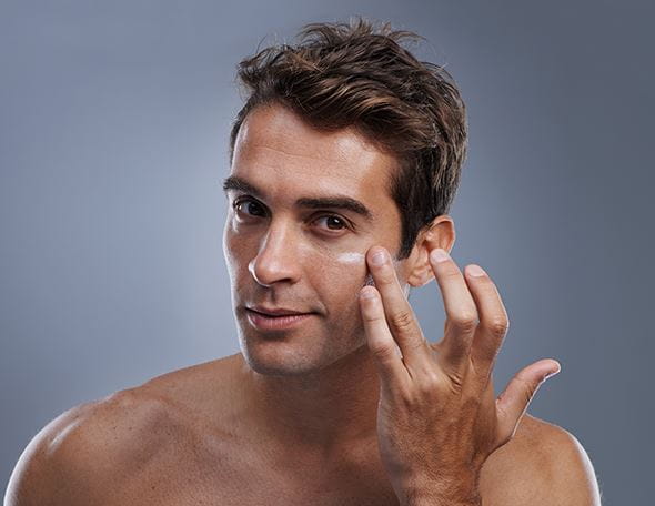 Nivea Men applying serum